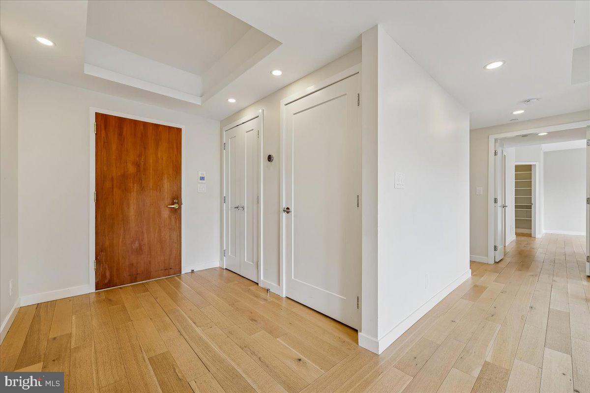5600 Wisconsin Avenue, Unit 705 Chevy Chase, MD 20815 - Photo 6 of 62 a view of hallway with wooden floor