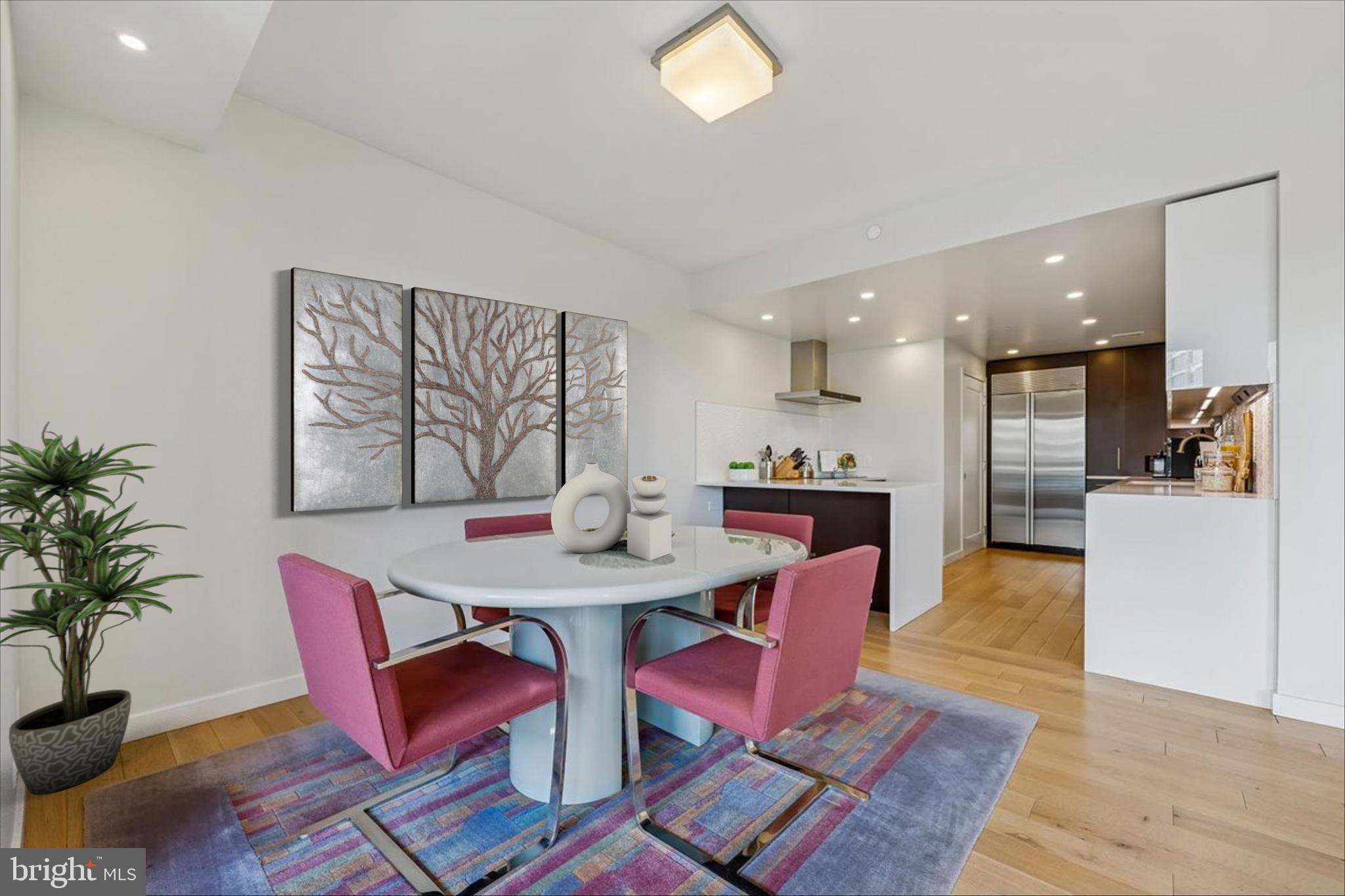 5600 Wisconsin Avenue, Unit 705 Chevy Chase, MD 20815 - Photo 10 of 62 a view of a dining room with furniture