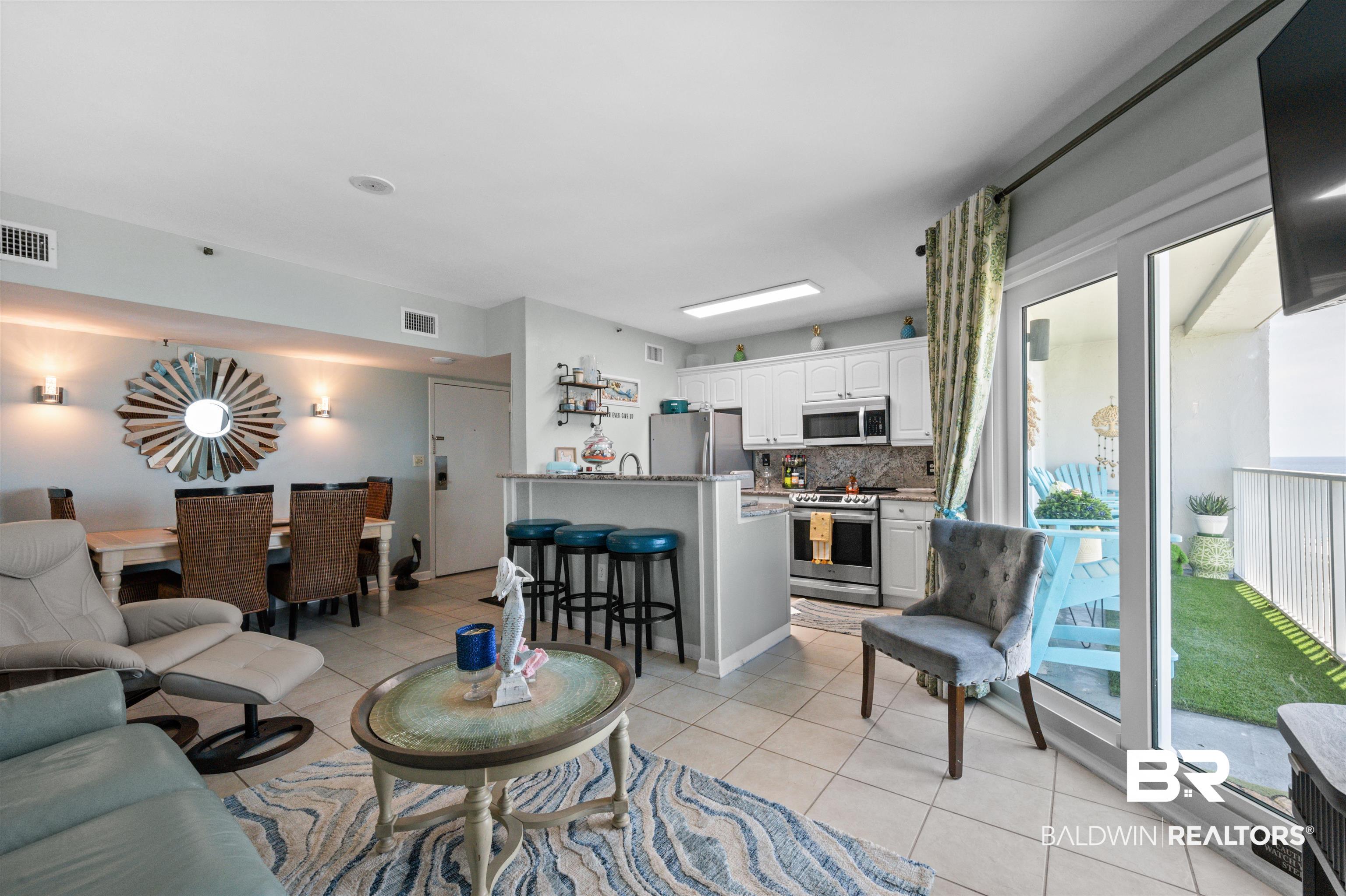 375 Plantation Road, Unit 5610 Gulf Shores, AL 36542 - Photo 3 of 33 Living area featuring light tile patterned flooring