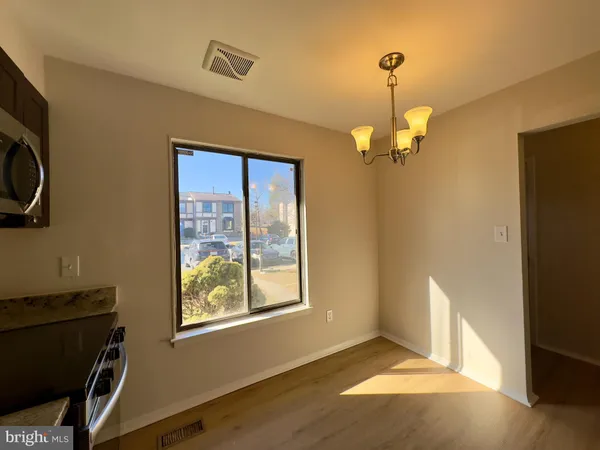 a view of livingroom with furniture and windows
