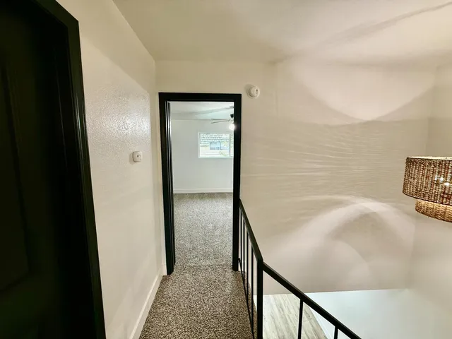 a view of balcony and wooden floor