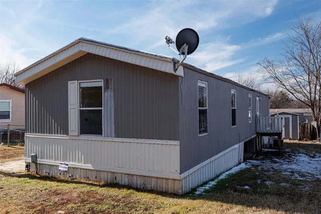 a house view with a backyard space