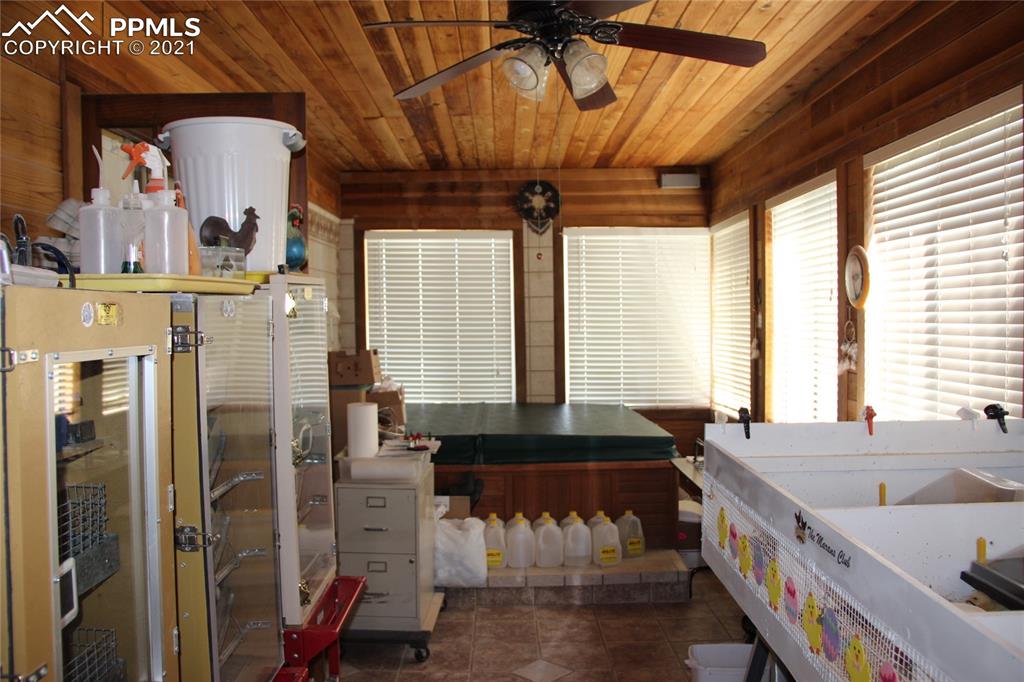 33375 Fogarty Road Calhan, CO 80808 - Photo 14 of 50 a kitchen with a sink and a refrigerator