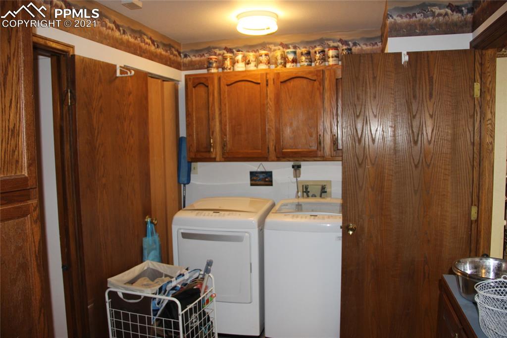33375 Fogarty Road Calhan, CO 80808 - Photo 19 of 50 a utility room with dryer and washer