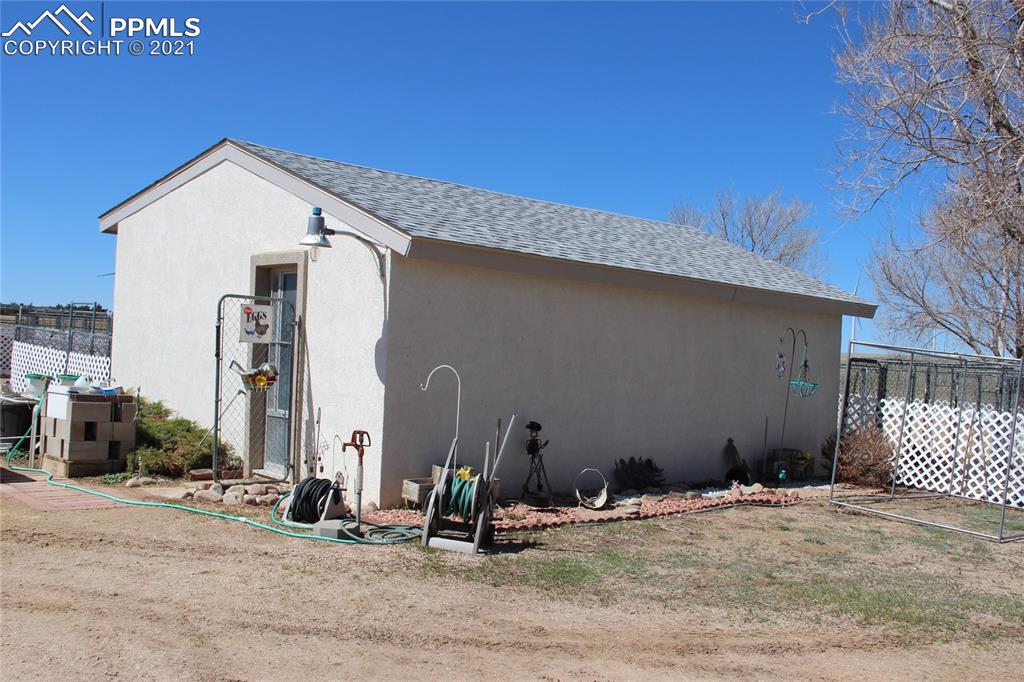 33375 Fogarty Road Calhan, CO 80808 - Photo 25 of 50 a view of a house with a patio