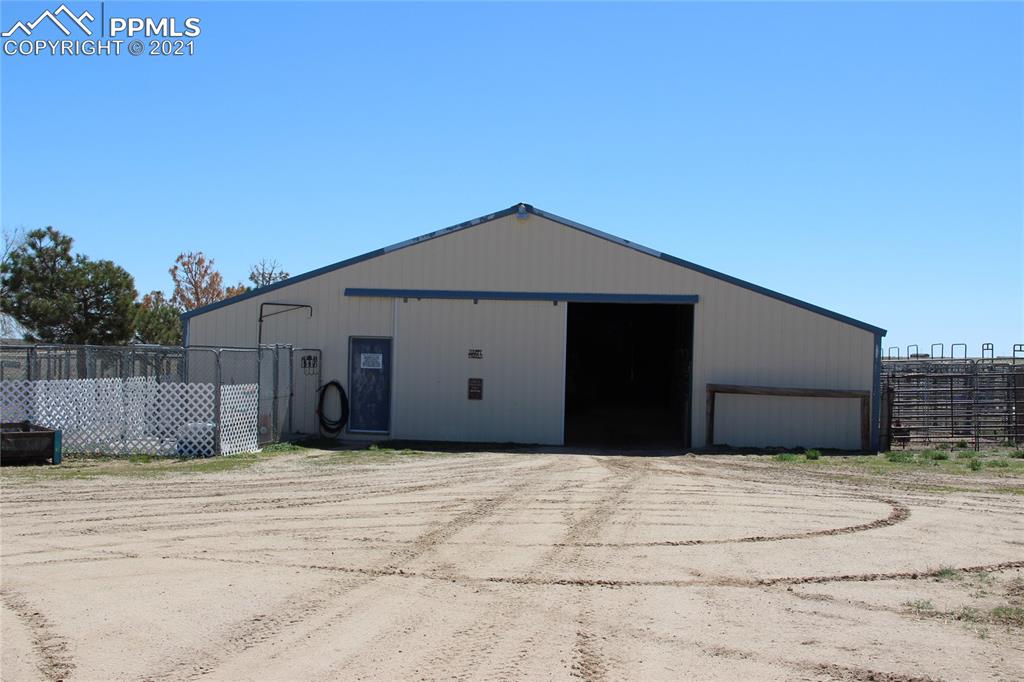 33375 Fogarty Road Calhan, CO 80808 - Photo 26 of 50 a house with a yard