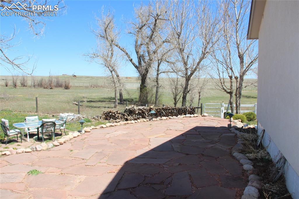 33375 Fogarty Road Calhan, CO 80808 - Photo 44 of 50 a view of a backyard of the house