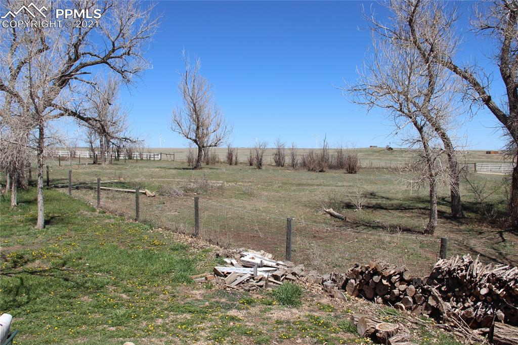 33375 Fogarty Road Calhan, CO 80808 - Photo 46 of 50 a view of a yard with wooden fence