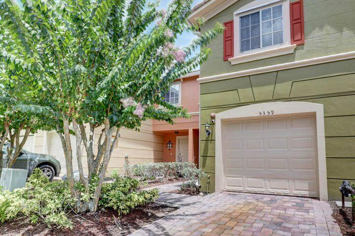 5359 Southeast Mitchell Lane Stuart, FL 34997 - Photo 3 of 21 VIEW GARAGE DOOR