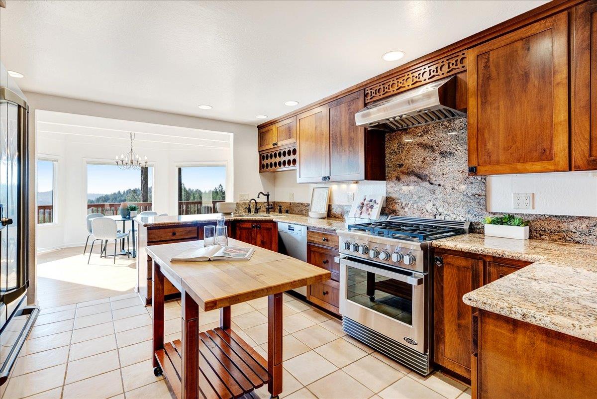 480 Quail Ridge Road Scotts Valley, CA 95066 - Photo 21 of 69 a kitchen with a stove a sink and a refrigerator