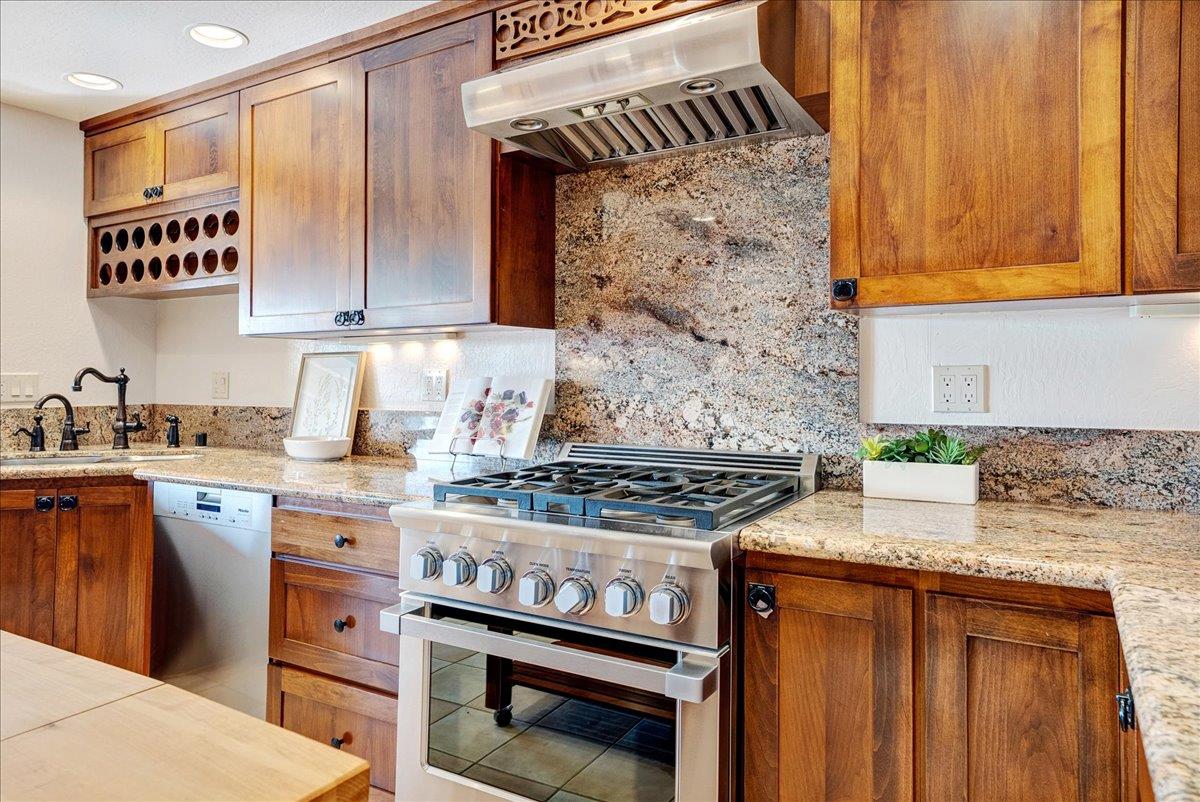 480 Quail Ridge Road Scotts Valley, CA 95066 - Photo 22 of 69 a kitchen with stainless steel appliances granite countertop a stove and a sink