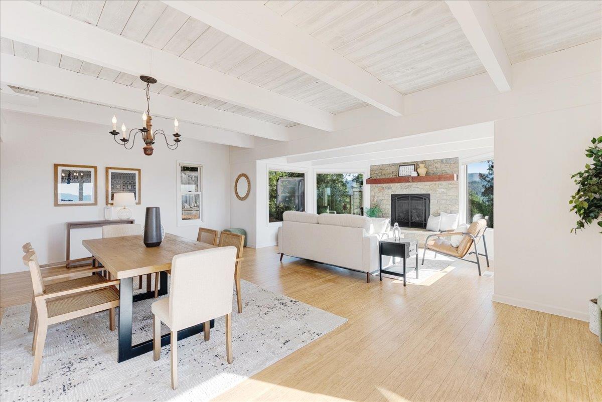 480 Quail Ridge Road Scotts Valley, CA 95066 - Photo 25 of 69 a living room with furniture a rug and a chandelier