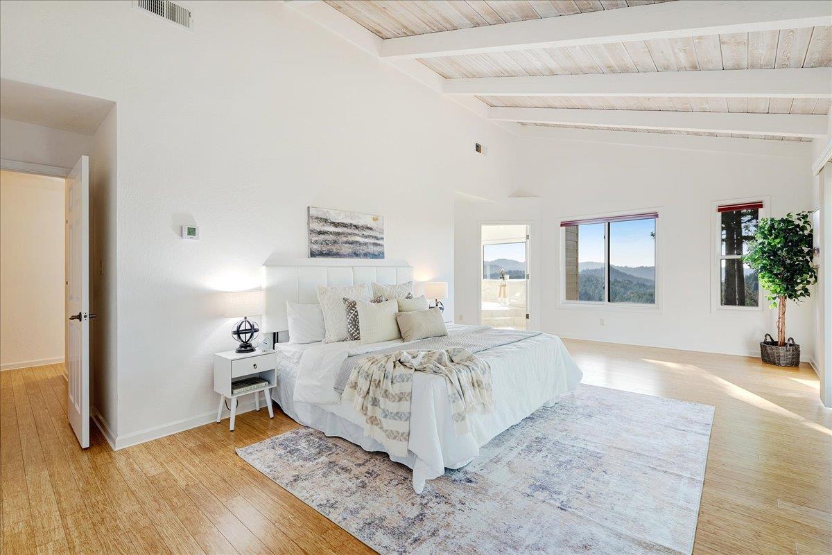 480 Quail Ridge Road Scotts Valley, CA 95066 - Photo 30 of 69 a living room with a bed furniture and a potted plant