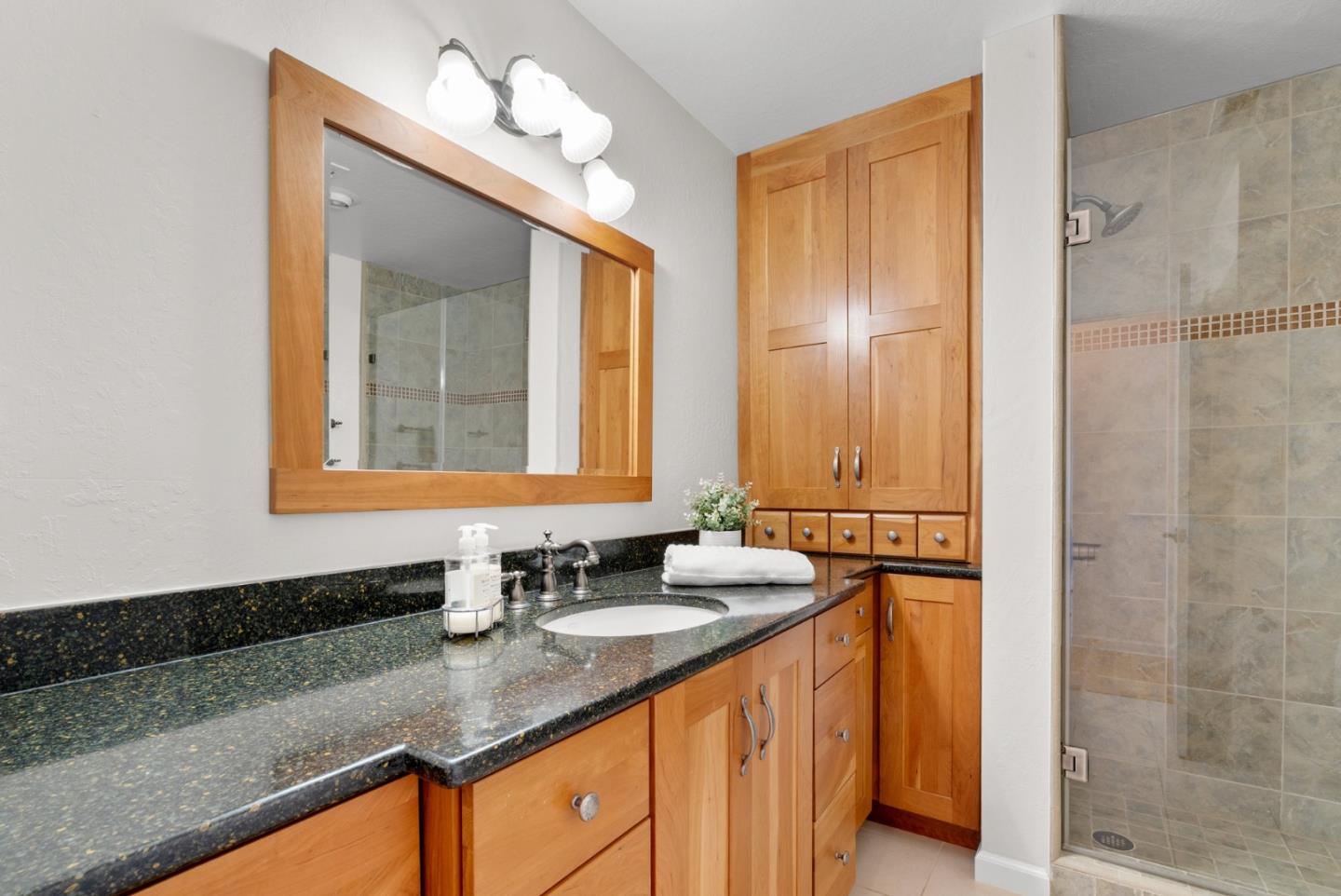 480 Quail Ridge Road Scotts Valley, CA 95066 - Photo 35 of 68 a bathroom with a double vanity sink and a mirror