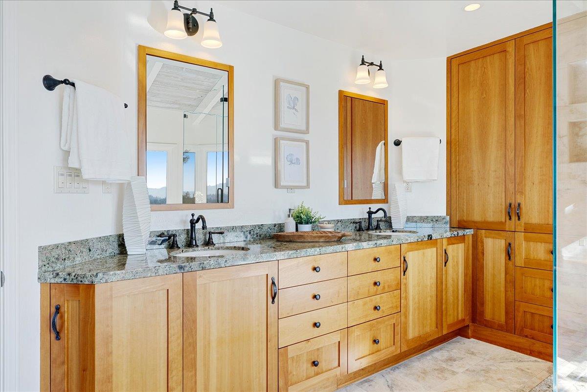 480 Quail Ridge Road Scotts Valley, CA 95066 - Photo 36 of 69 a bathroom with a granite countertop sink and a mirror