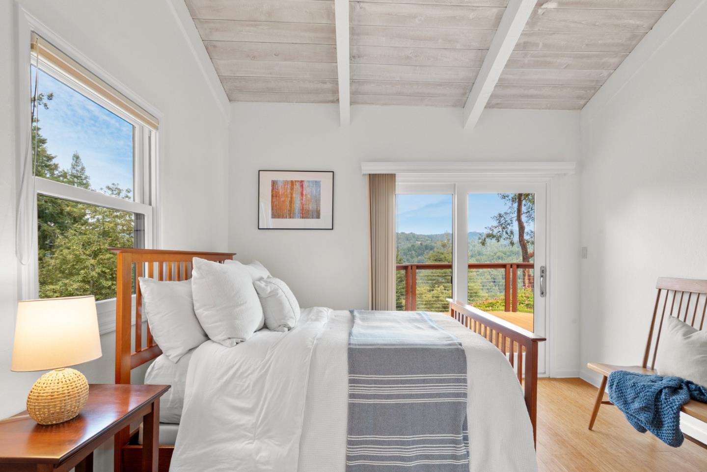 480 Quail Ridge Road Scotts Valley, CA 95066 - Photo 41 of 68 a bedroom with a bed and wooden floor