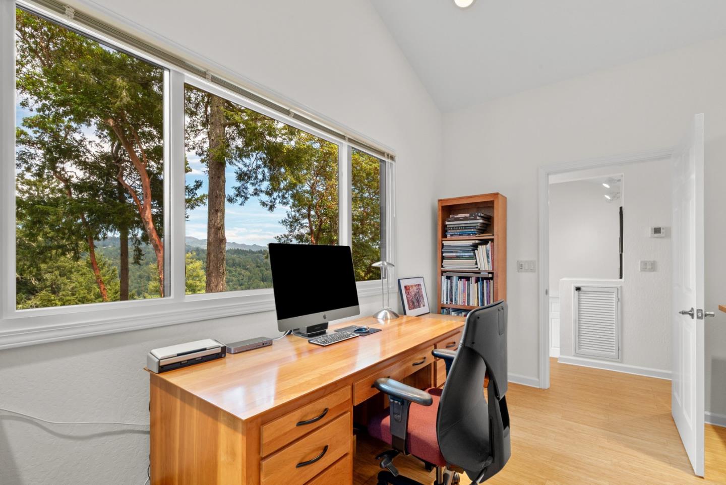 480 Quail Ridge Road Scotts Valley, CA 95066 - Photo 44 of 68 a view of a workspace with furniture and a window