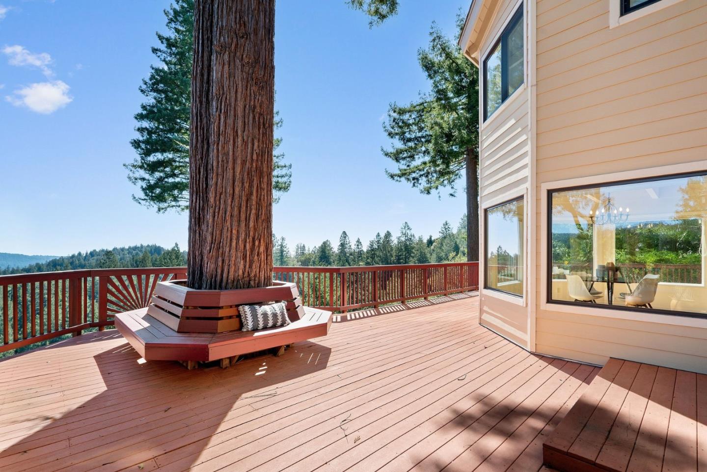 480 Quail Ridge Road Scotts Valley, CA 95066 - Photo 50 of 69 a balcony with wooden floor table and chairs