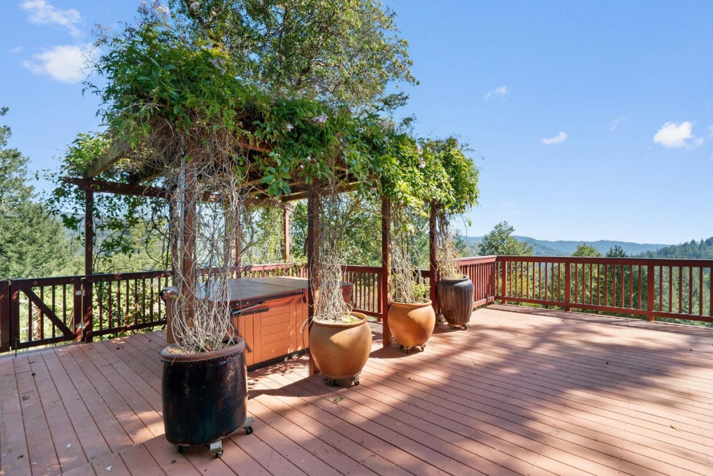 480 Quail Ridge Road Scotts Valley, CA 95066 - Photo 58 of 69 a view of a deck with chairs next to a yard