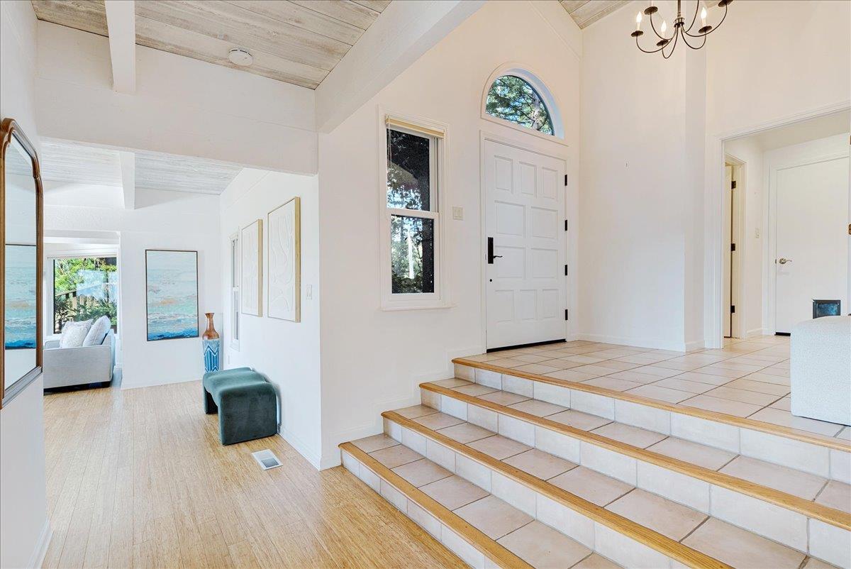 480 Quail Ridge Road Scotts Valley, CA 95066 - Photo 9 of 69 a bedroom with a bed and glass door