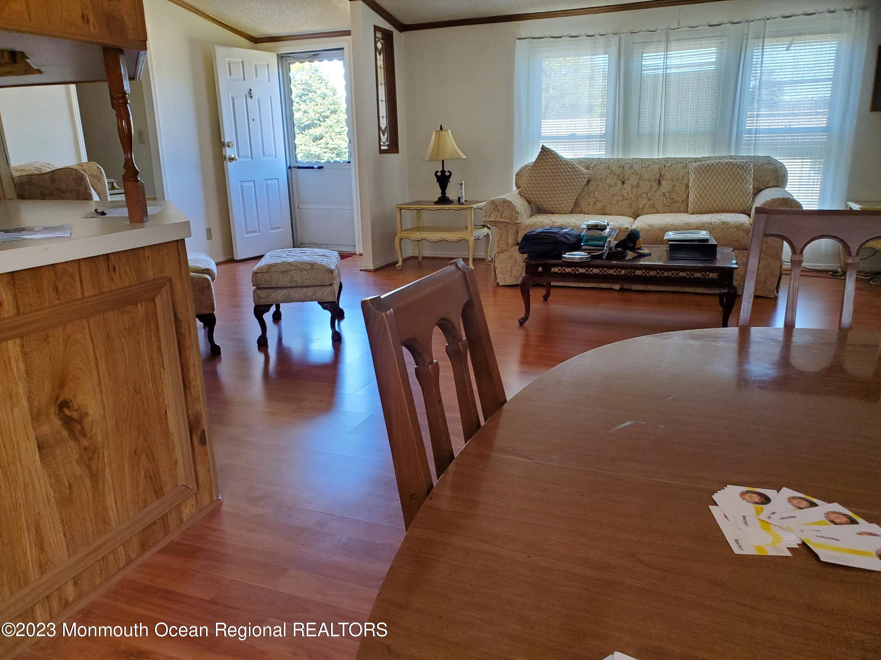 30 Pine Ridge Boulevard Whiting, NJ 08759 - Photo 3 of 16 a living room with furniture and a fireplace
