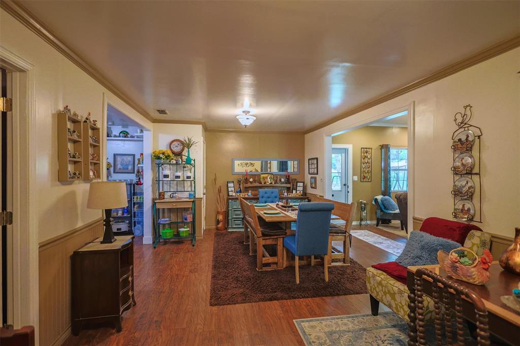 309 Tejas Trail Springtown, TX 76082 - Photo 8 of 40 a living room with furniture and wooden floor