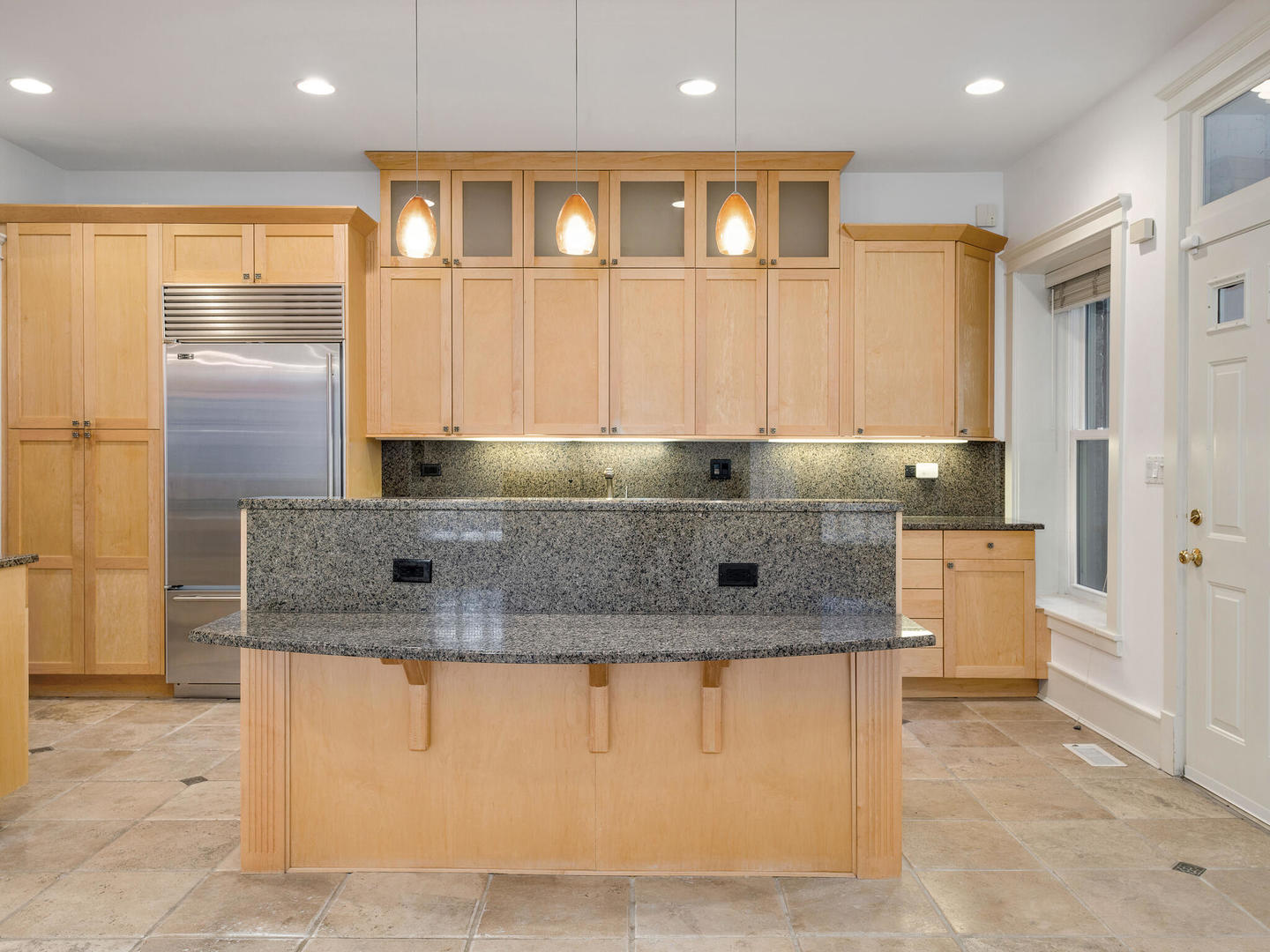 3020 North Sheridan Road, Unit 1N Chicago, IL 60657 - Photo 19 of 29 a kitchen with stainless steel appliances granite countertop a sink and a refrigerator