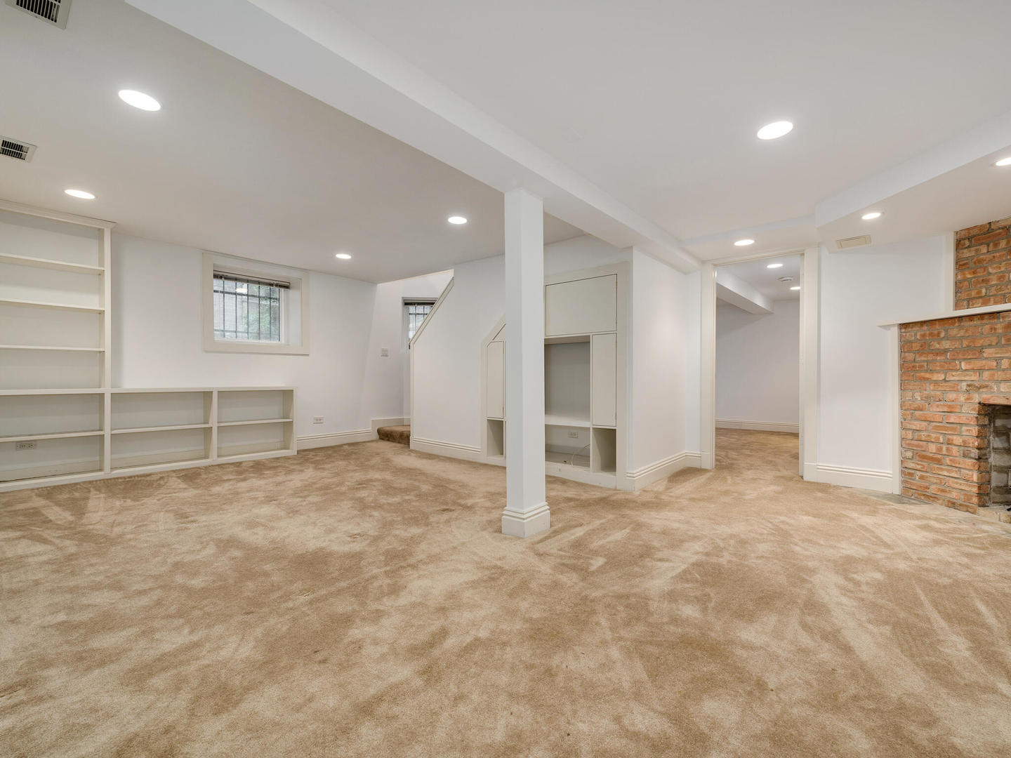 3020 North Sheridan Road, Unit 1N Chicago, IL 60657 - Photo 23 of 29 a view of an empty room with a fireplace