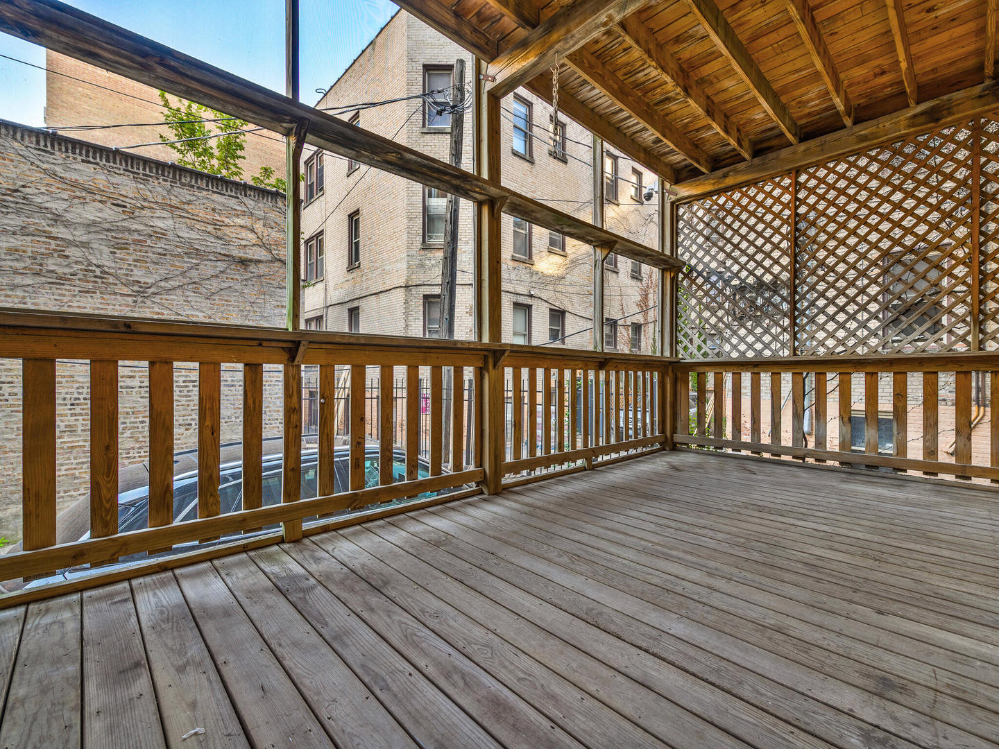 3020 North Sheridan Road, Unit 1N Chicago, IL 60657 - Photo 27 of 29 a view of wooden balcony