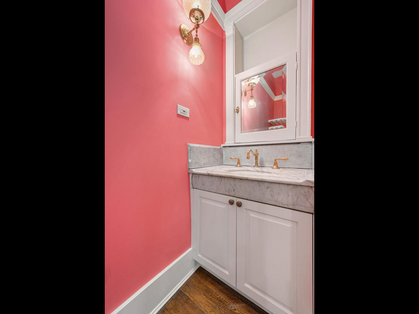 3020 North Sheridan Road, Unit 1N Chicago, IL 60657 - Photo 9 of 29 a bathroom with a sink vanity and mirror