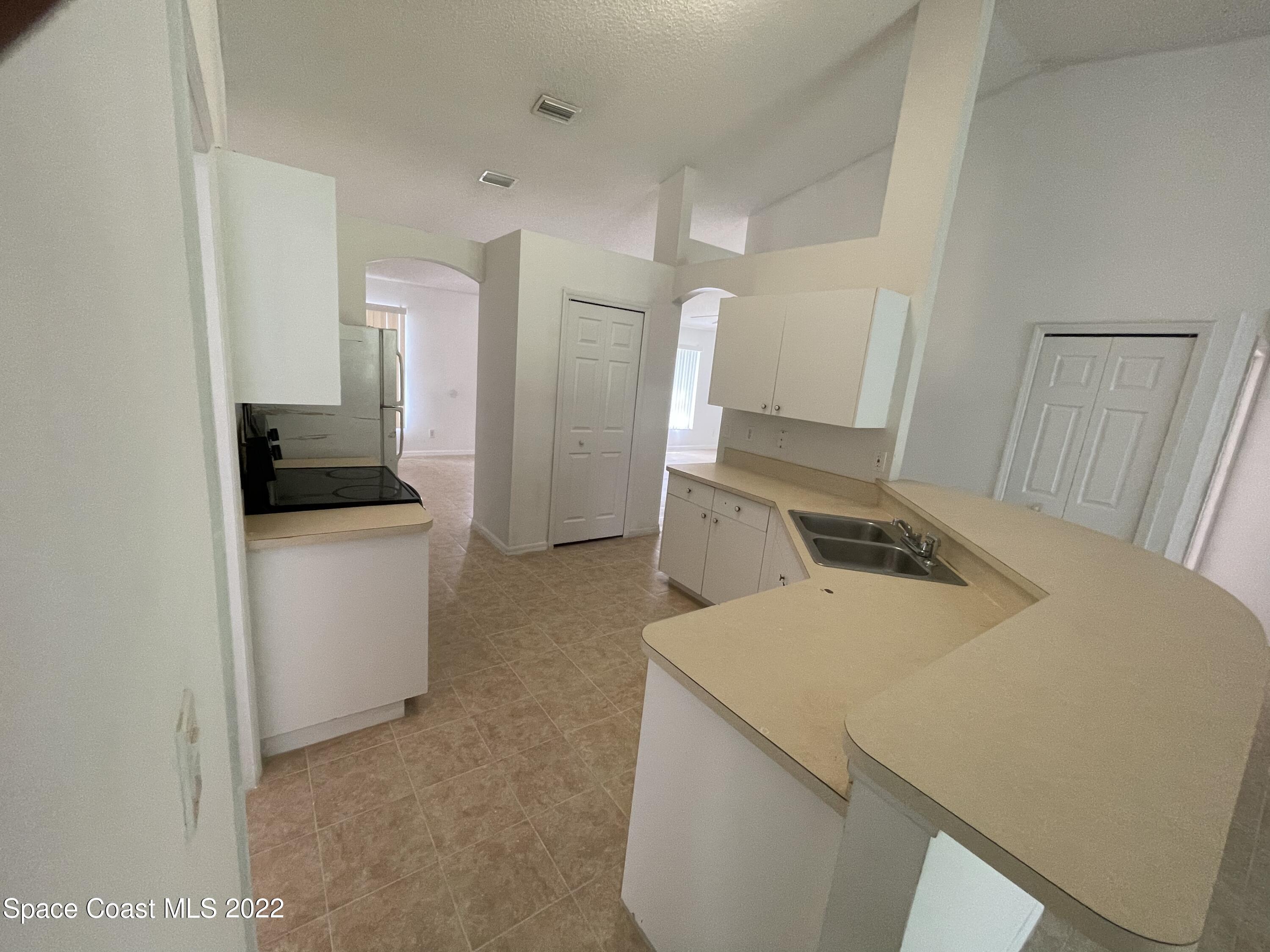 1598 Degroodt Road Southwest Palm Bay, FL 32908 - Photo 5 of 9 FD4BE2DA-8BE5-43C2-BDC1-396EE0E66715