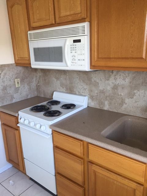 101 South Golfview Road, Unit 16 Lake Worth Beach, FL 33460 - Photo 13 of 16 a view of washer and dryer