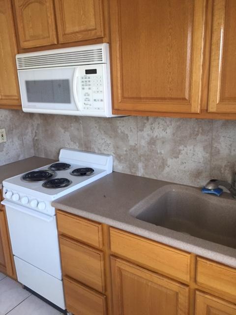 101 South Golfview Road, Unit 16 Lake Worth Beach, FL 33460 - Photo 14 of 16 a close view of washer and dryer