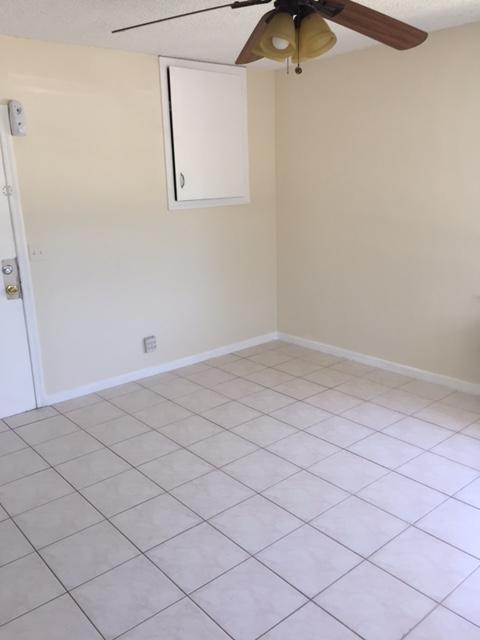101 South Golfview Road, Unit 16 Lake Worth Beach, FL 33460 - Photo 4 of 16 a view of a room