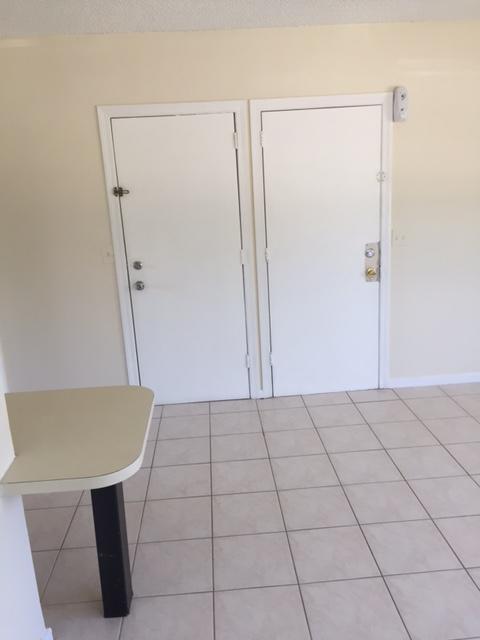 101 South Golfview Road, Unit 16 Lake Worth Beach, FL 33460 - Photo 5 of 16 an empty room with an empty space