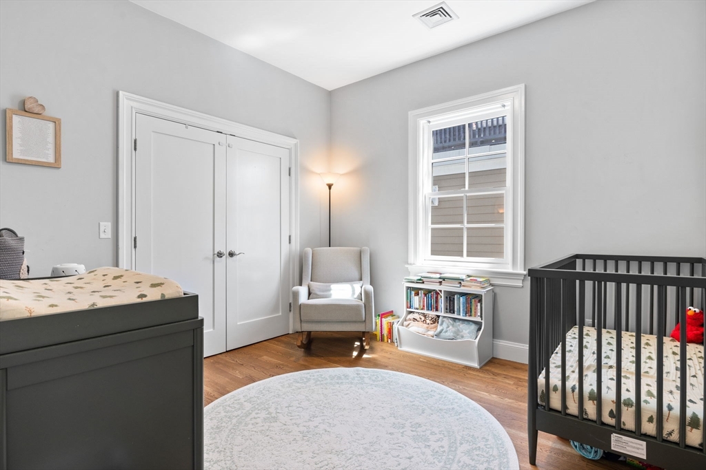 25 Mercer Street, Unit PH5 Boston, MA 02127 - Photo 15 of 22 a reading room with furniture and a window