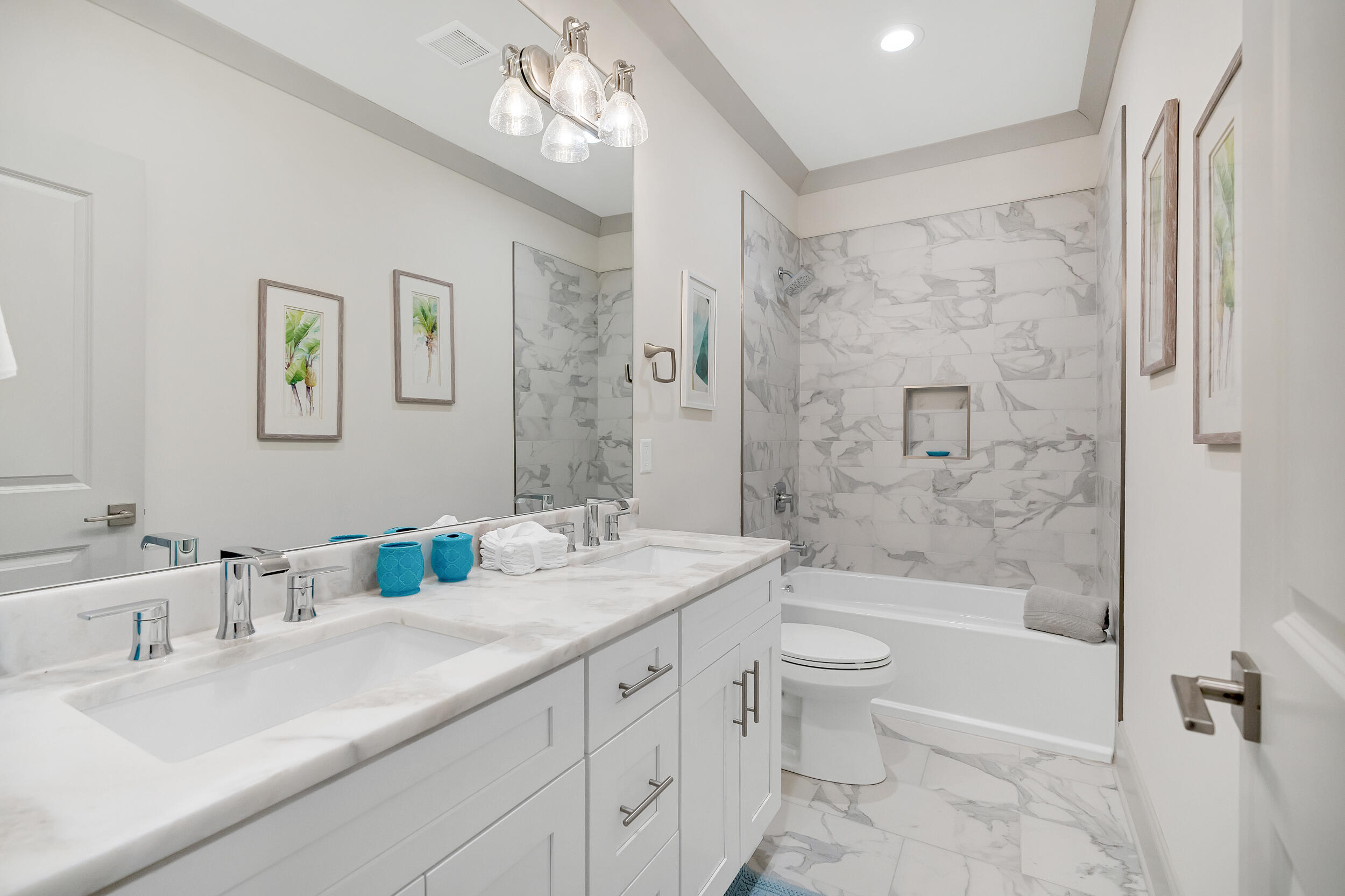 16 Golden Bell Ct Inlet Beach, Unit 16A Inlet Beach, FL 32461 - Photo 25 of 46 a bathroom with a granite countertop sink a toilet a large mirror a shower and bathtub