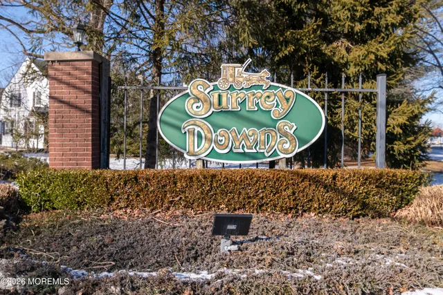 a sign that is on a brick wall