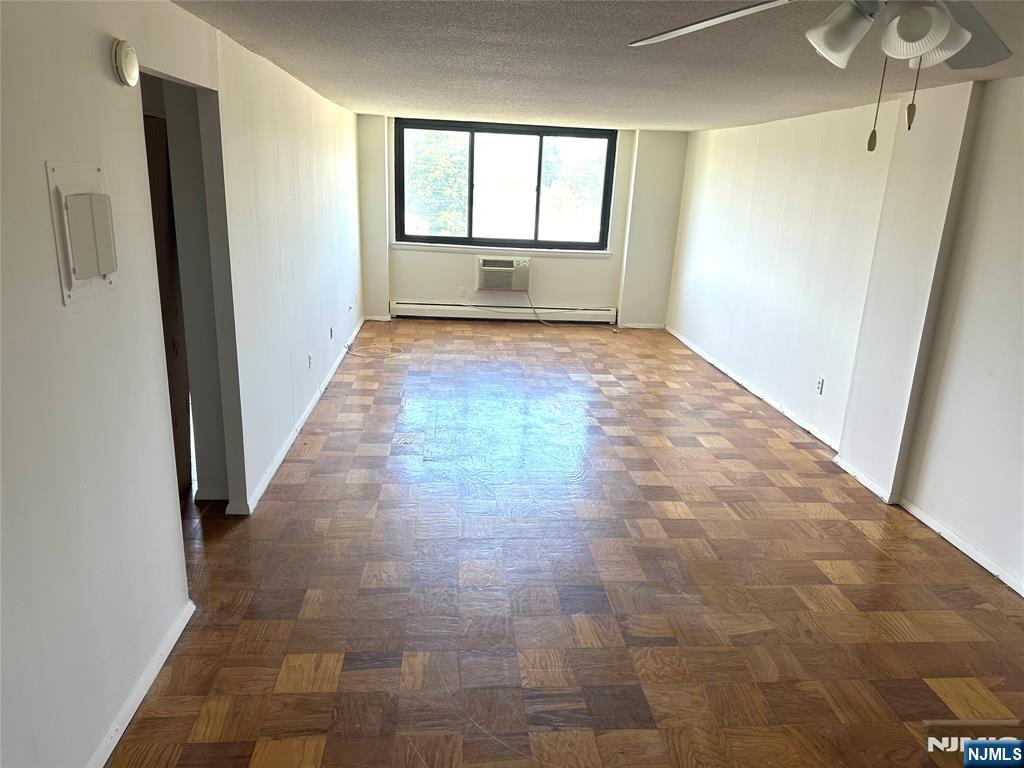 25 Zabriskie Street, Unit 3F Hackensack, NJ 07601 - Photo 6 of 10 a view of an empty room with a window