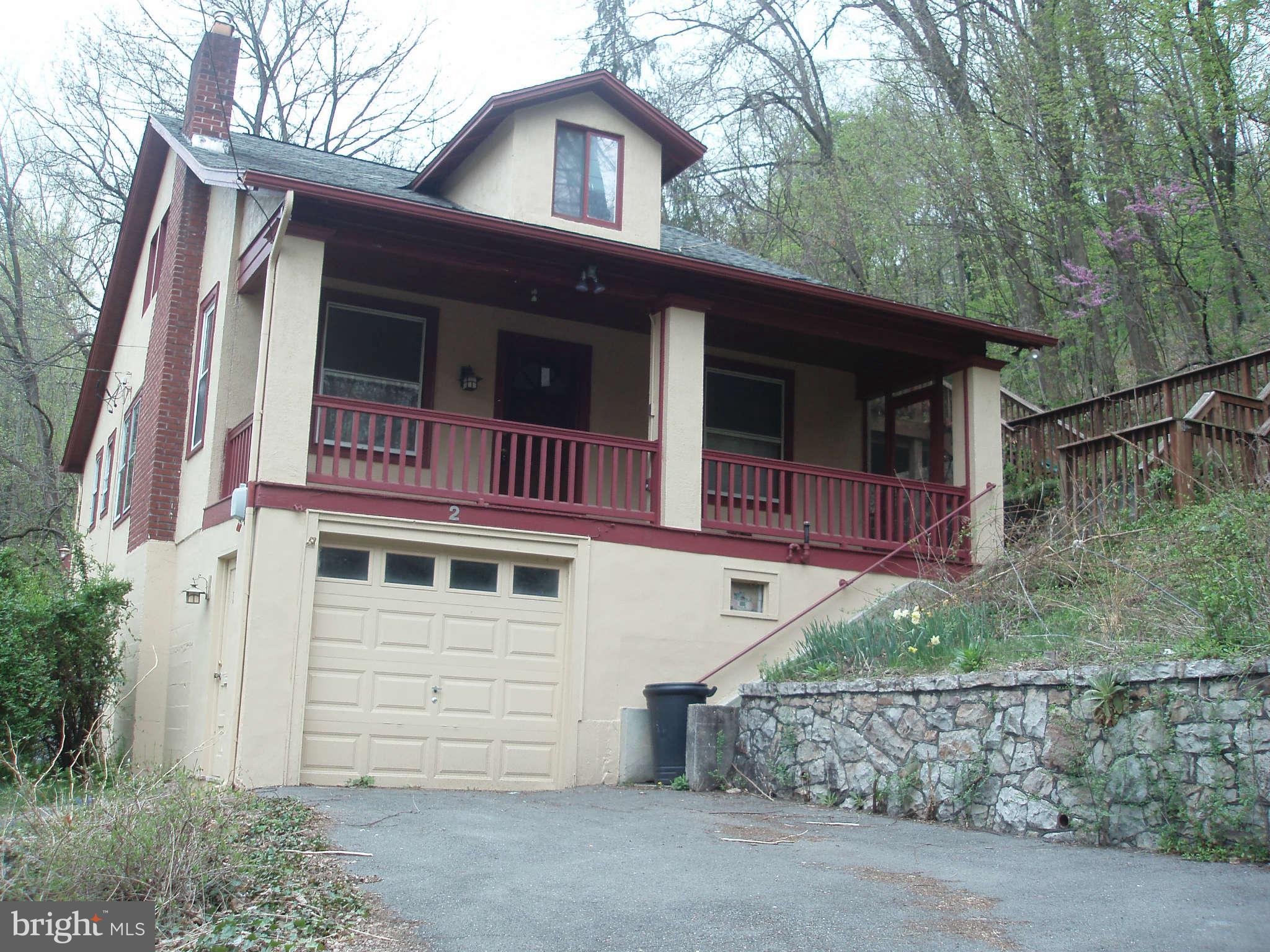 2 Warren Street Berkeley Springs, WV 25411 - Photo 1 of 30 front view of a house with a street