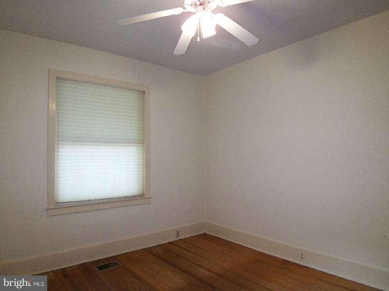 2 Warren Street Berkeley Springs, WV 25411 - Photo 14 of 30 an empty room with a window