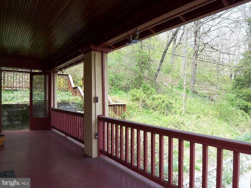 2 Warren Street Berkeley Springs, WV 25411 - Photo 5 of 30 a view of a porch