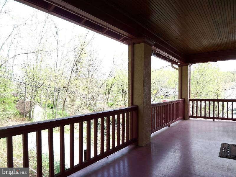 2 Warren Street Berkeley Springs, WV 25411 - Photo 6 of 30 a view of balcony with wooden floor