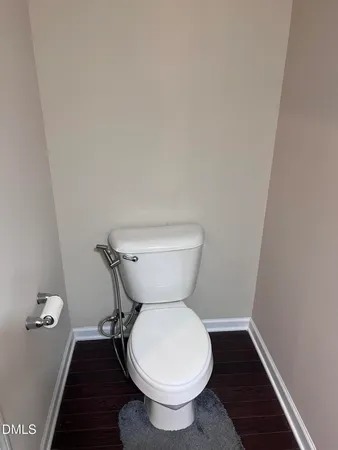 a bathroom with a toilet and a sink