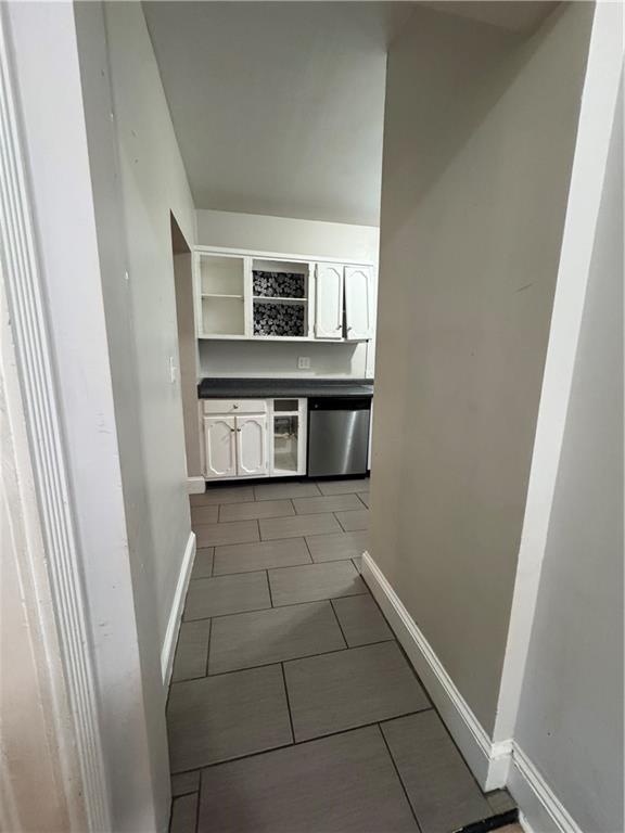 1230 South Madison Avenue Monroe, GA 30655 - Photo 23 of 37 a bathroom with a sink and a mirror