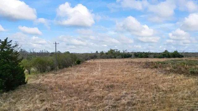 a view of a pathway both side of yard