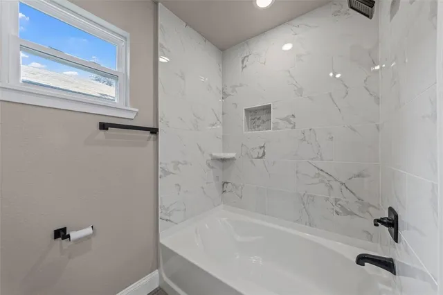 a bathroom with a bathtub