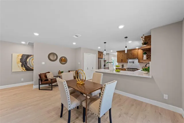 a view of a dining room with furniture