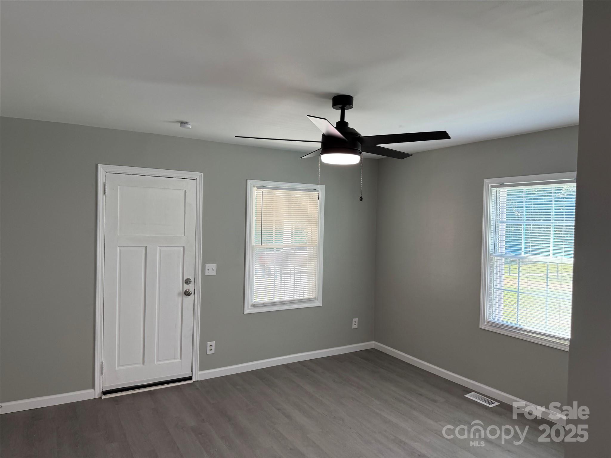 837 Sikes Mill Road Monroe, NC 28110 - Photo 6 of 16 a view of an empty room with a window