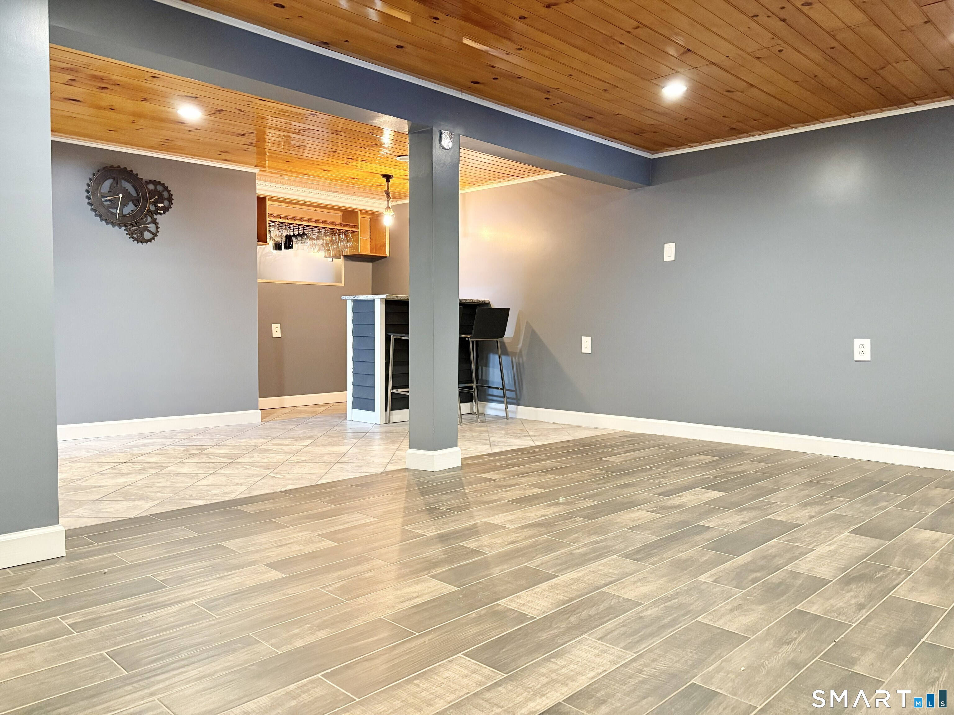 31 Pegasus Drive Groton, CT 06340 - Photo 13 of 17 a view of an empty room with wooden floor and a window
